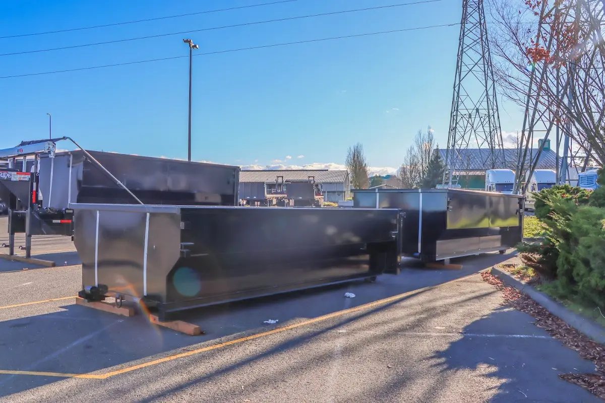 Roll-off dumpster ready for waste disposal at job site for 6 Yard Dumpster Rental in Clear Lake